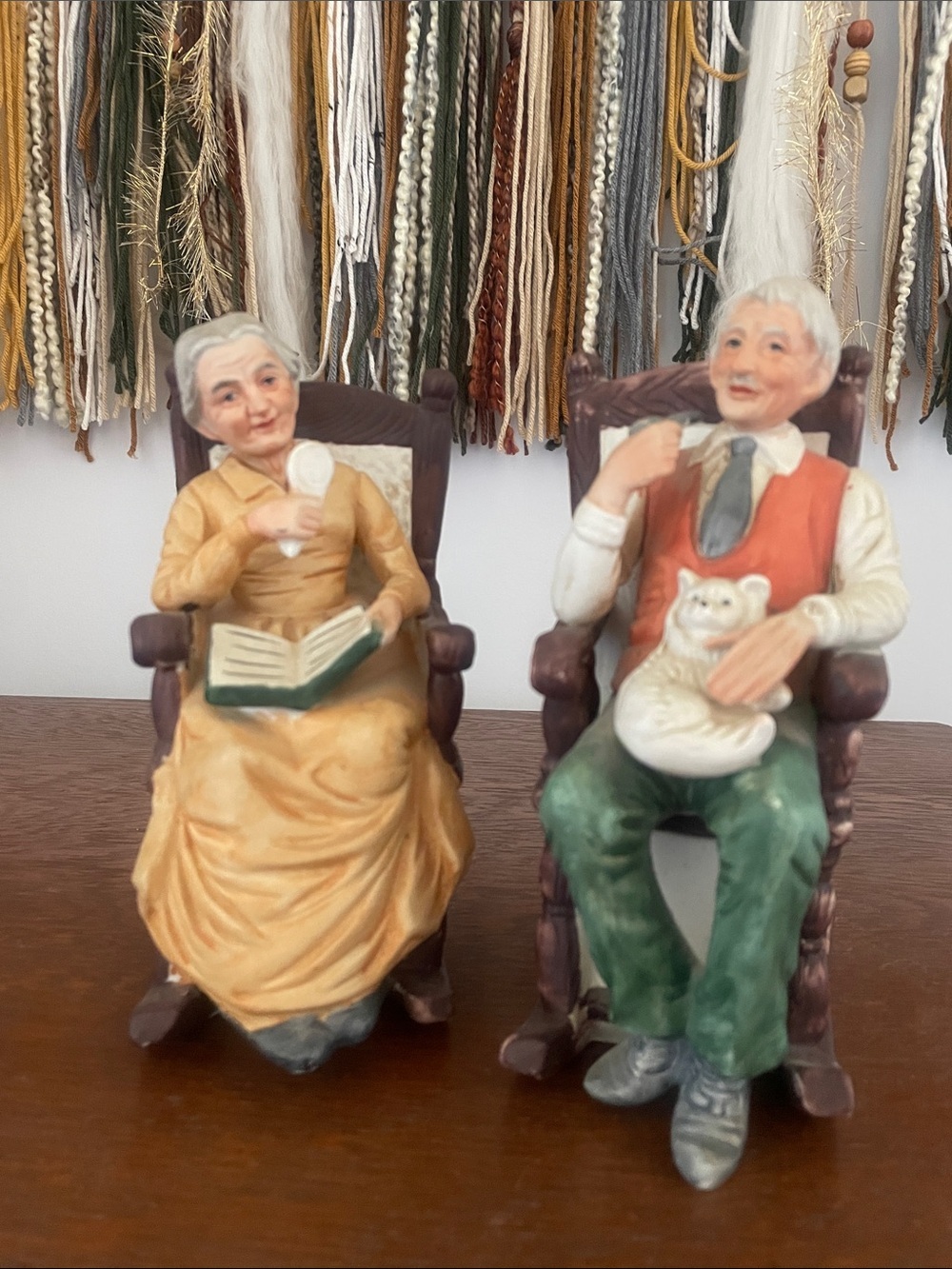 Hand-Painted Elderly Couple Figurines in rocking chairs